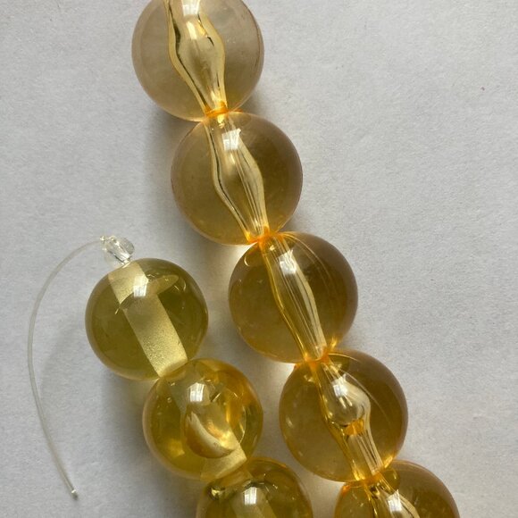 NWT 2 Strands of Transparent Amber-colored large round beads - Picture 4 of 5